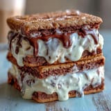 Vanilla Bean Frappuccino Ice Cream Sandwiches with creamy vanilla ice cream between espresso cookies, a frozen dessert inspired by coffee shop flavors.